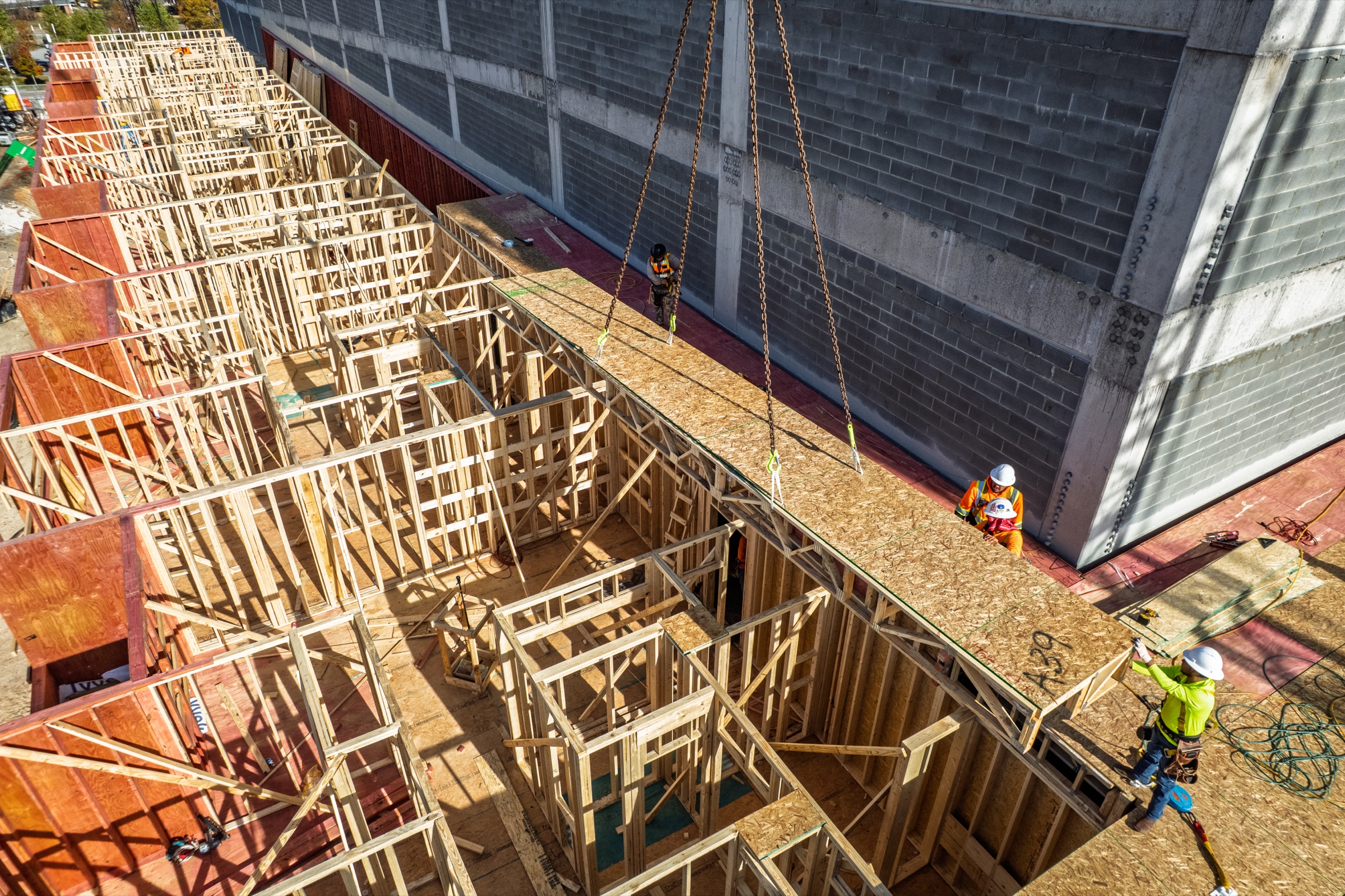 Floor cassette being installed at construction site, Raleigh North Carolina — construction photography by Bruce Peter Morin